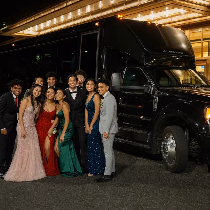 Party bus interior with wraparound leather seating and LED lighting in Los Angeles