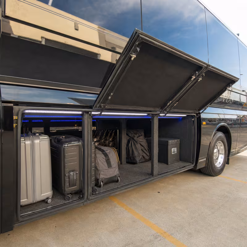 Party bus interior with wraparound leather seating and LED lighting in Los Angeles