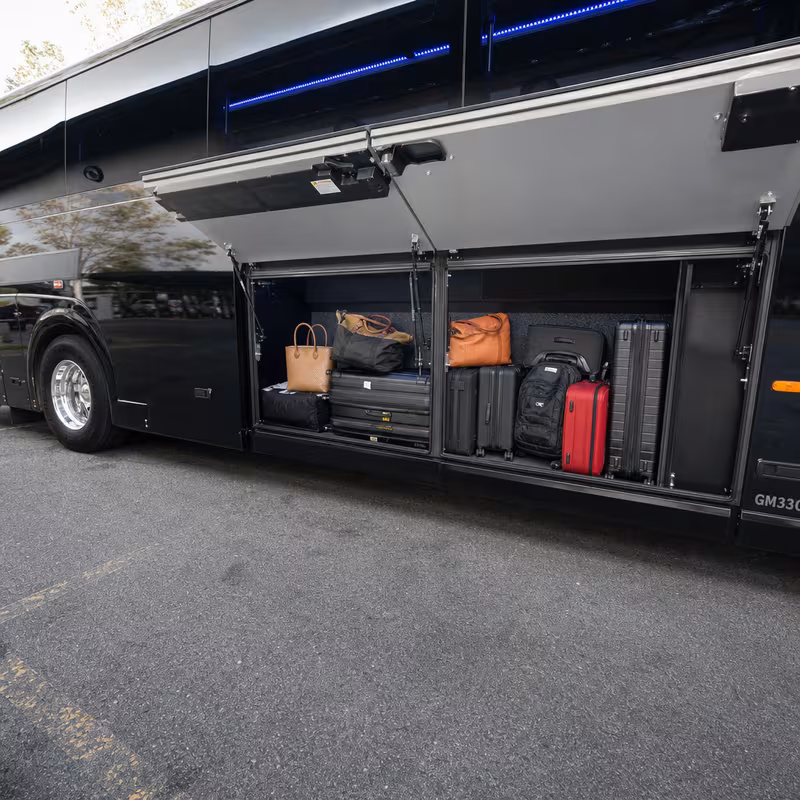 Party bus interior with wraparound leather seating and LED lighting in Los Angeles