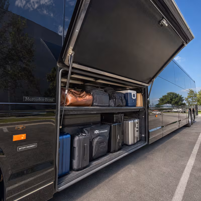Party bus interior with wraparound leather seating and LED lighting in Los Angeles